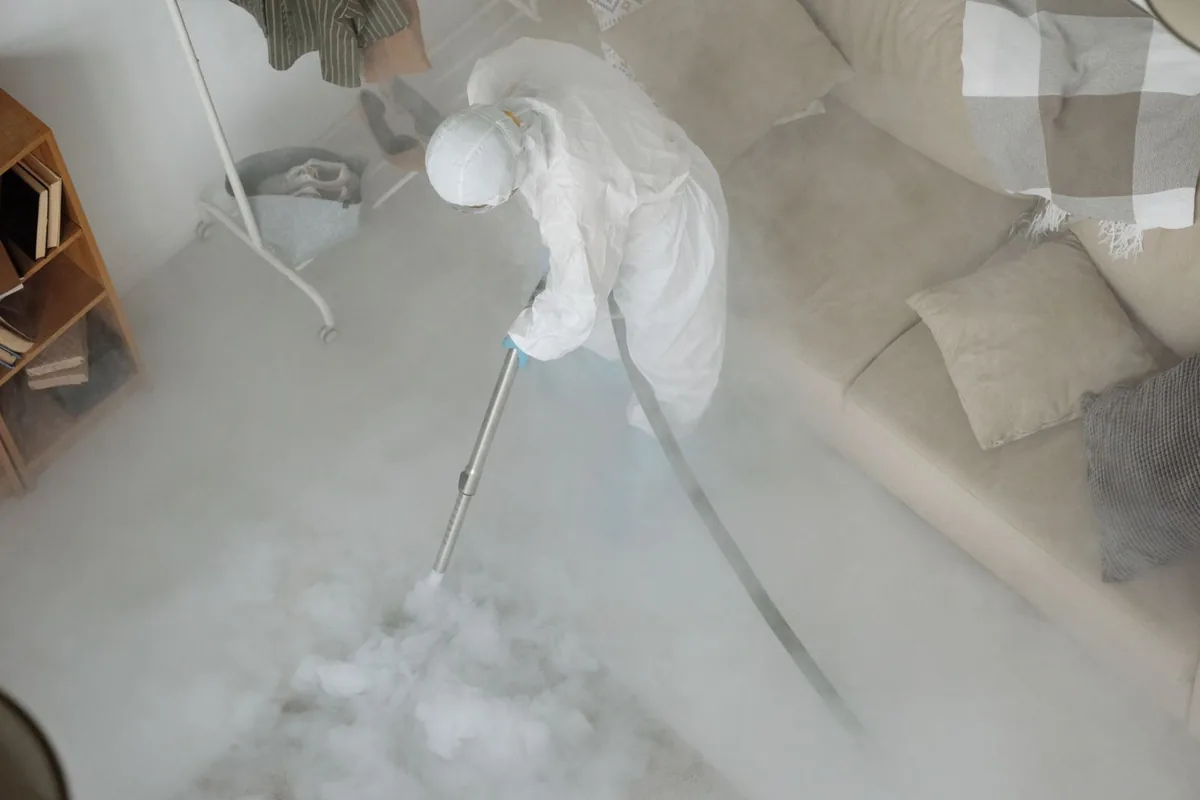 Biohazard cleanup technician in protective equipment, Mount Angel, OR